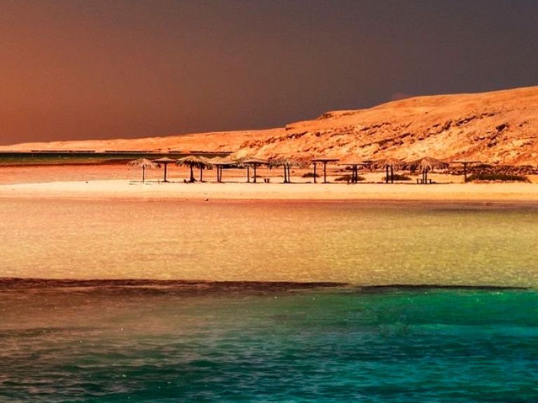 Orange Bay in Hurghada offers pristine beaches on the Red Sea, attracting tourists for water sports and romantic getaways with its clear waters and white sand.