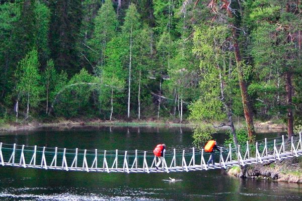 Located near Russia in Finland's Pohjois-Karjala region, Oulanka National Park boasts stunning forests, rivers, and waterfalls across 80 square kilometers. It offers diverse wildlife, hiking trails, and outdoor activities like canoeing and skiing.