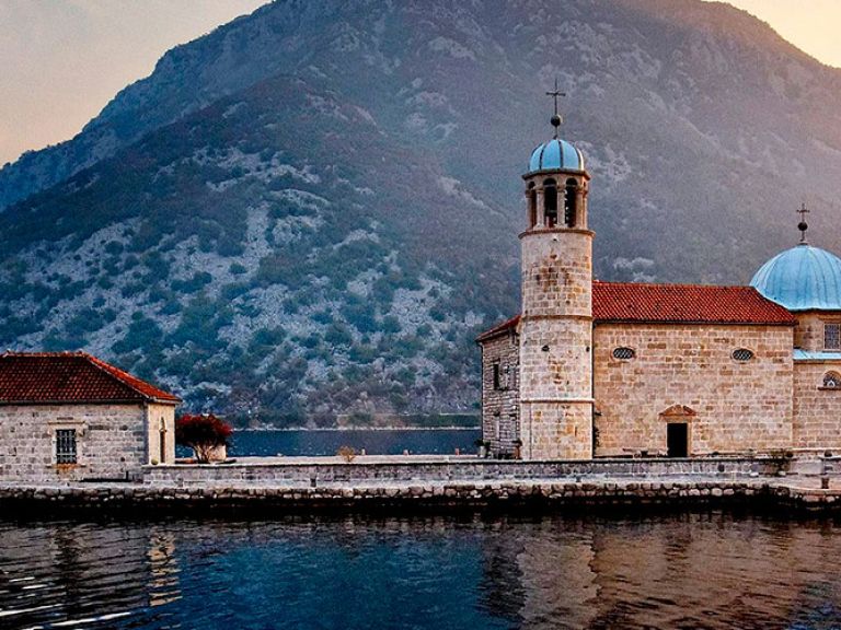 Gospa od Skrpjela, or Our Lady of the Rocks, is a man-made island in Montenegro's Bay of Kotor. It features the Church of Our Lady of the Rocks, offering serene surroundings and breathtaking views. A must-visit tourist attraction.