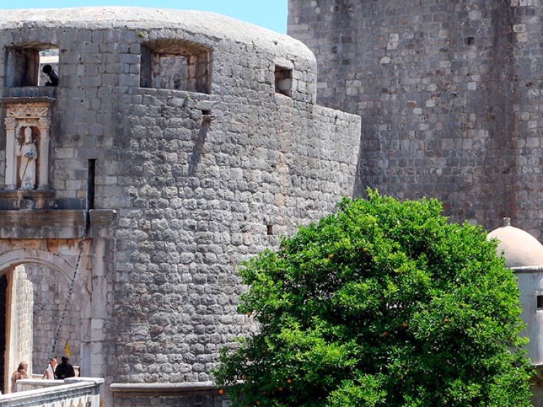 Discover Pile Gate, a renowned landmark in historic Dubrovnik, Croatia. As a key entrance to the Old Town, this 16th-century gate boasts stone archways and impressive defense towers, guarding the city's rich past and captivating visitors.