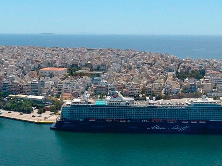 Piraeus, in Greece's Attica region, is a bustling port city 11 miles southwest of Athens. As the largest Greek port and a major European hub, it connects the Mediterranean through the West Pier, East Pier, and Old Port areas.