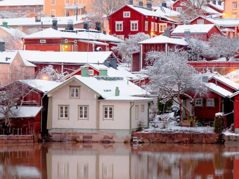Located on the Porvoo River's banks, the Old Town of Porvoo is a vibrant blend of shops, restaurants, historic buildings like the 14th-century Porvoo Cathedral, and 18th-century Red Warehouses now hosting boutiques and artisan studios.