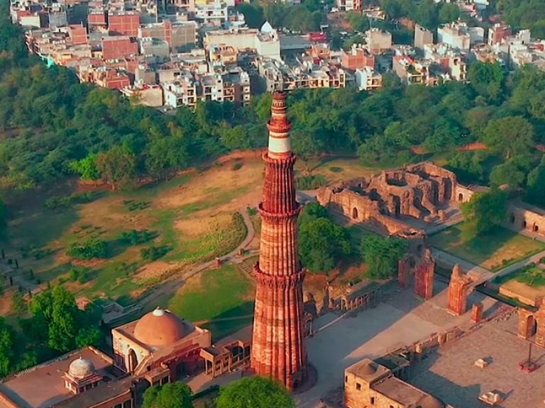 Qutb-Minar in New Delhi stands at 73 meters, built in the 13th century from red sandstone. It's India's tallest tower, showcasing intricate carvings and dedicated to the first Sultan of Delhi, Qutubuddin Aibak.