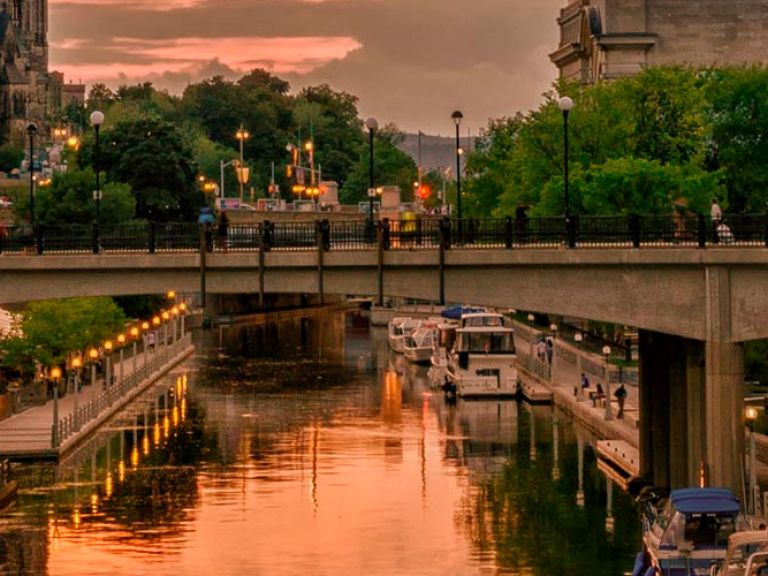 The Rideau Canal, a remarkable 19th-century engineering feat, spans 202km between Ottawa and Kingston Harbour in Canada. It offers a unique history, stunning scenery, and charming parks and restaurants for tourists.