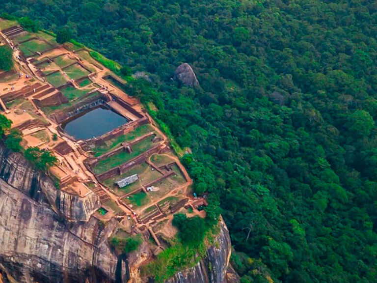 Sigiriya, a rock fortress in Sri Lanka's Central Province, was a palace and stronghold under King Kashyapa. Now, it's a top tourist spot, attracting global visitors to marvel at its architecture and panoramic views.