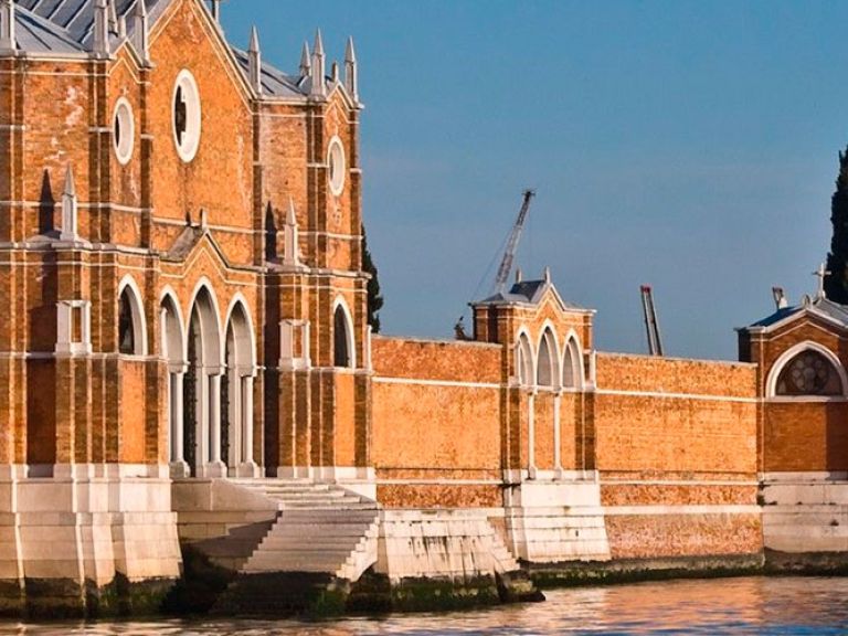 San Michele, a serene island in Venetian Lagoon, serves as Venice's cemetery since the 19th century. Notable figures like Igor Stravinsky and Ezra Pound rest here, attracting visitors to its tranquil beauty.