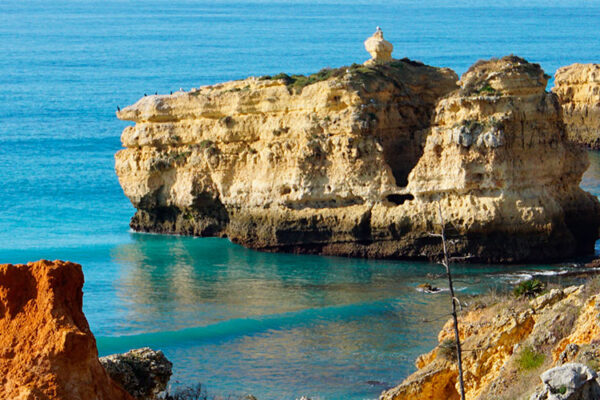 São Rafael Beach, nestled along the Algarve coastline in Portugal, is a breathtaking destination that captures the essence of natural beauty. With its golden sands, turquoise waters, and rugged cliffs, it offers a picturesque setting for sunbathing, swimming, and exploring hidden coves. A serene and captivating coastal retreat.