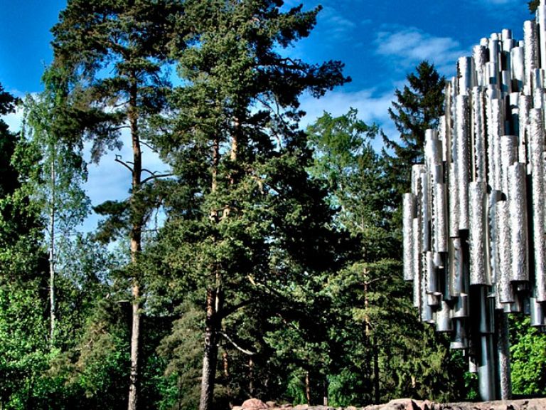 The Sibelius Monument in Helsinki, Finland, is a wave-like sculpture of over 600 welded steel pipes, symbolizing music's flow. Designed by Eila Hiltunen in 1967, this tribute to Finnish composer Jean Sibelius is a popular attraction in Sibelius Park.