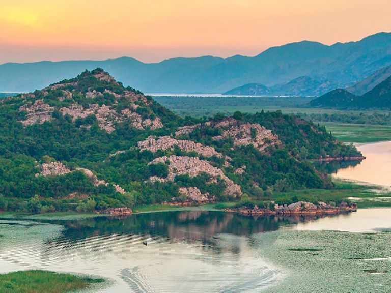 Welcome to Skadar Lake National Park, a pristine oasis nestled between Montenegro and Albania. Immerse yourself in nature's wonders as you discover the largest lake in the Balkans, where diverse ecosystems and breathtaking landscapes await.