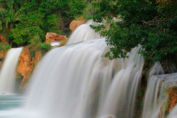 Krka Waterfalls (Skradinski Buk) in Croatia, near Skradin, are the most famous and visited waterfalls of Krka National Park. The Krka River flows through a stunning karst landscape, creating lakes, canyons, and waterfalls.