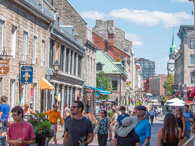 Explore Montreal's Iconic St. Paul Street - A Historic Shopping Haven. Wander among historic buildings, housing quirky boutiques, high-end stores, art galleries, and delightful restaurants, blending past and present in perfect harmony.