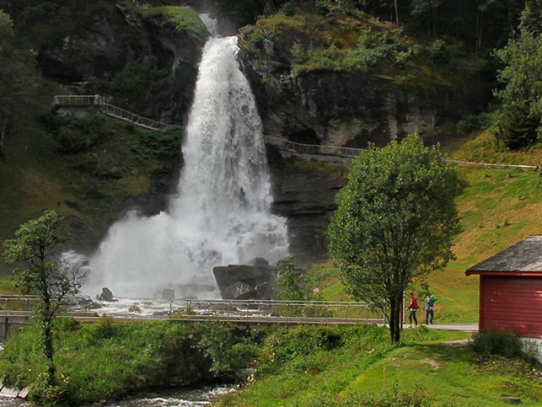 Steinsdalsfossen is a waterfall located in the village of Norheimsund in the Hordaland county of Norway. It is one of the most popular tourist destinations in the region, known for its breathtaking views and easy accessibility.