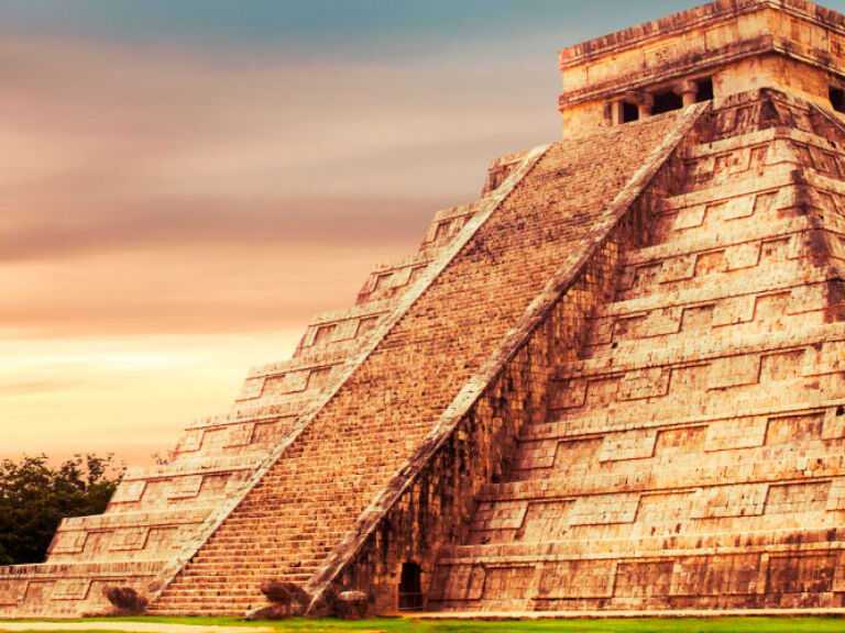 The Temple of Kukulkan Serpent, a Mesoamerican step pyramid, pays homage to the mythical deity, Kukulkan, revered in Maya mythology. Situated in Chichen Itza, the ancient capital of the Maya civilization.