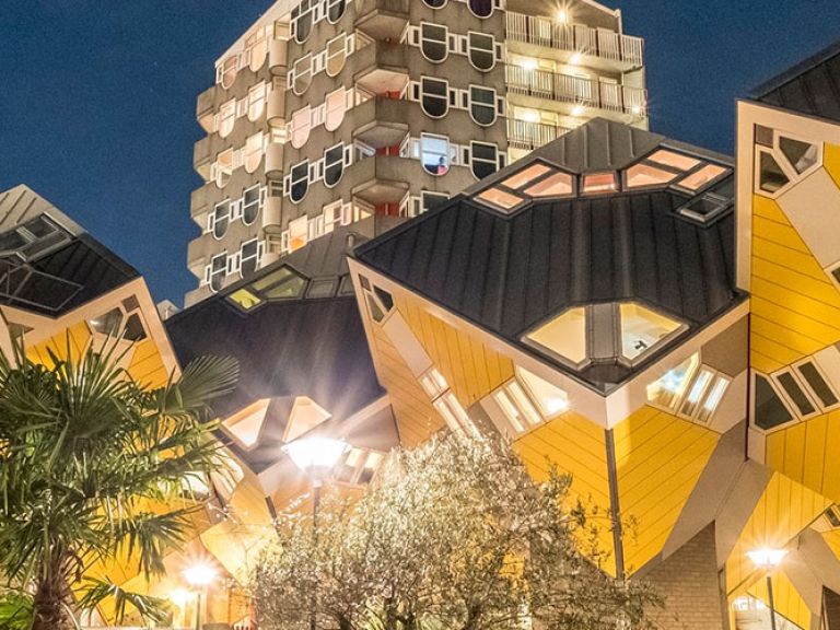 Discover Rotterdam's iconic Cube House, a group of 38 connected, cube-shaped houses designed by Piet Blom in 1984. Its abstract tree-like formation and unique angles captivate, showcasing architects' creativity even in limited spaces.