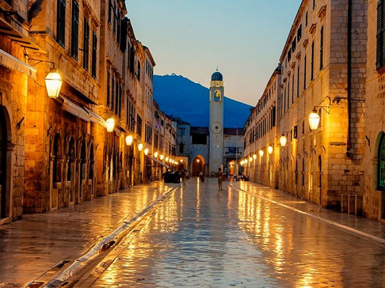 Discover Stradun, the heart of beautiful Dubrovnik, Croatia. This pedestrian-only street stretches 300 meters from Pile Gate to the Old Port, adorned with charming restored buildings. Immerse yourself in its history and elegance.