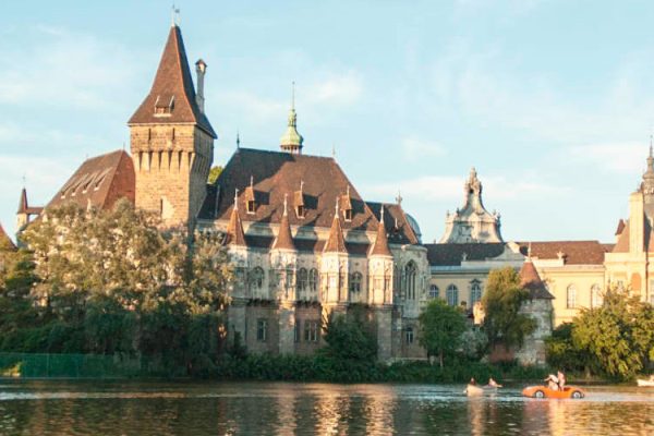 Vajdahunyad Castle is a romantic castle located in Budapest, Hungary, in the City Park near the boating lake and skating rink. It is known for its eclectic architectural style and picturesque setting, making it a popular tourist destination.