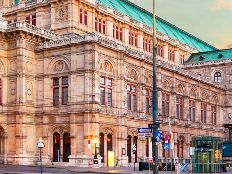 The Vienna State Opera, opened in 1869, boasts the world's largest repertoire, making it a renowned opera house. With a rich history of famous performances, it attracts music lovers worldwide.