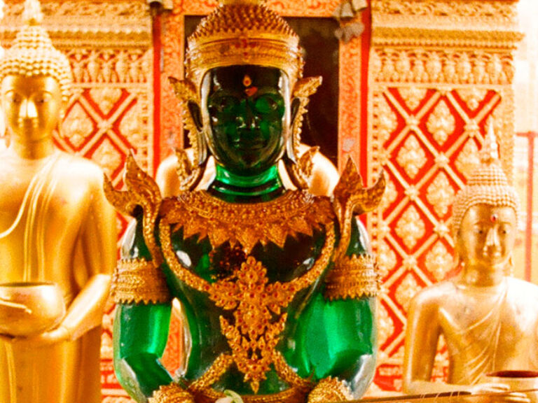 Wat Phra Kaew, also known as the Temple of the Emerald Buddha, is located in Bangkok, Thailand within the Grand Palace. Built in 1782, it houses important Buddhist artifacts, including the Emerald Buddha, a sacred statue carved from a single piece of jade.