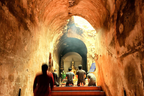 Wat U-Mong, established in 1296 in Chiang Mai, Thailand, is renowned as a meditation center. Uniquely featuring a natural cave system used by monks for meditation, this temple complex, surrounded by trees, offers a tranquil experience for visitors seeking inner peace.