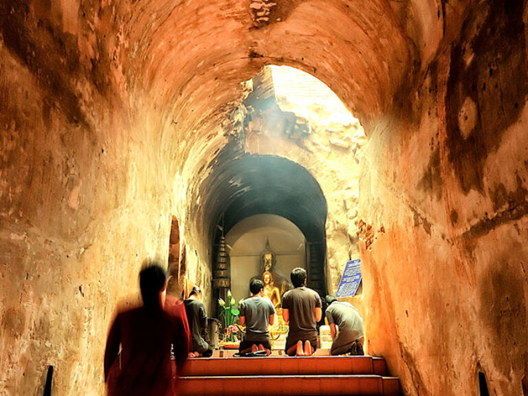 Wat U-Mong, established in 1296 in Chiang Mai, Thailand, is renowned as a meditation center. Uniquely featuring a natural cave system used by monks for meditation, this temple complex, surrounded by trees, offers a tranquil experience for visitors seeking inner peace.