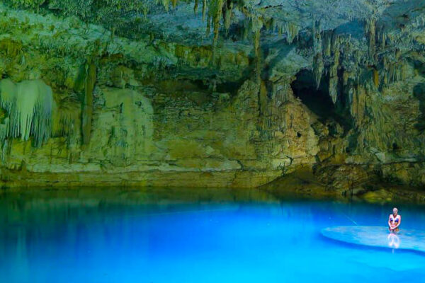 Yax-Muul, a natural park 15 minutes from Tulum, offers a unique escape to tranquillity. Experience a Mayan ritual, explore 2 pristine underground cenotes, and connect with nature amidst diverse wildlife and lush vegetation.