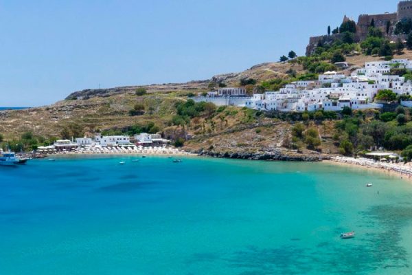 Lindos, located on Rhodes Island in Greece, is renowned for its pristine beaches, ancient ruins, and white-washed houses. Two popular beaches, Lindos Beach and tranquil St. Paul's Bay, are both within walking distance of the town.