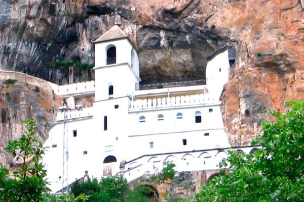Ostrog Monastery in Montenegro, a Serbian Orthodox marvel, nestles on Mount Ostroška Greda. Around 50 kilometers from Nikšić, it's an awe-inspiring sight built into and carved from the rock, comprising the Lower and Upper Monastery.