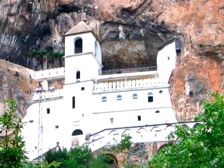 Ostrog Monastery in Montenegro, a Serbian Orthodox marvel, nestles on Mount Ostroška Greda. Around 50 kilometers from Nikšić, it's an awe-inspiring sight built into and carved from the rock, comprising the Lower and Upper Monastery.