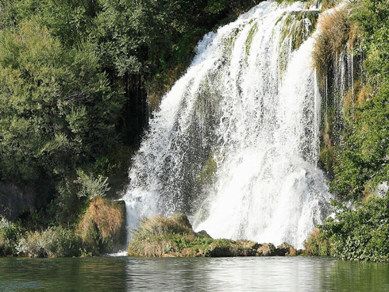 The waterfalls are located on the Slap River, which flows into Lake Visovac. The Slap Roški Waterfalls are one of the most popular tourist attractions in Croatia and are known for their natural beauty.