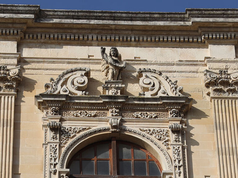 Discover the stunning St. Chiara Church in Lecce, Italy. Despite being unfinished, it remains one of the area's most beautiful churches. Its majestic facade overlooks Santa Chiara square, and inside, you'll be amazed by high ceilings and ornate details. A must-see in Lecce that will leave you in awe.