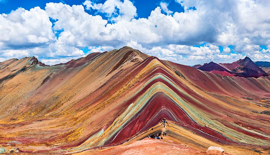 Rainbow Mountains, Cuzco, Peru: Peru, a captivating South American country, shares its vibrant culture and breathtaking landscapes with neighboring countries like Bolivia, Brazil, and Chile. It's a land of contrasts, from the Andean peaks to the Amazon rainforest, offering a rich blend of indigenous and Spanish influences. Peru is not just a destination; it's an experience waiting to unfold.