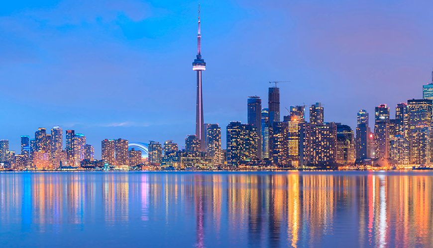 Scenic view at Toronto city waterfront skyline: Canada is one of the most beautiful countries in the world, full of picturesque forests, mountains, and lakes that make it a fantastic place for camping, hiking, or just wandering around and admiring. Canada has a long and rich heritage, with a wealth of famous attractions and places of interest to visit, including the Canadian Mountains, Niagara Falls, St. Lawrence River, Hudson Bay, Montreal, Ottawa, Toronto, Quebec, Nova Scotia, Vancouver, Manitoba and Alberta.