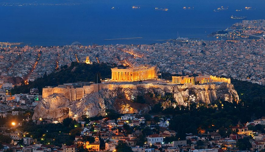 Athens skyline from Mt Lykavitos: Athens, the enchanting capital of Greece, effortlessly combines ancient heritage with a vibrant modern culture. The city is renowned for its historic sites, pulsating nightlife, delicious cuisine, and friendly locals, making it a must-visit destination on your next vacation.