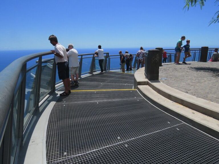 Madeira Sea Cliff: Embark on an exhilarating half-day adventure with our 4WD open-top roof vehicle, exploring the captivating sights of Madeira Island. Discover the awe-inspiring skywalk at "Cabo Girão" towering 580 meters above, witness breathtaking viewpoints nestled at 1200 meters high, traverse enchanting forests adorned with diverse trees and flowers, and conclude your journey at the picturesque coastal fishing village of Camara de Lobos, known for its connection to Winston Churchill.