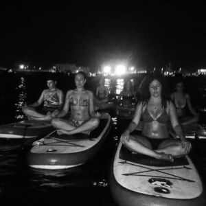 Yoga Lesson Riding A Sup In Ostia Lido Beach