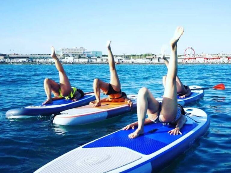 Yoga Lesson Riding A Sup In Ostia Lido Beach
