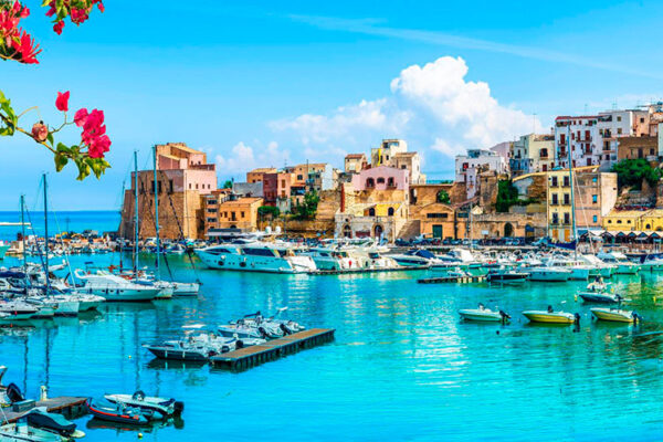 Palermo, Sicily's capital and Italy's largest island, offers diverse attractions for all ages. From UNESCO-listed historical monuments to breathtaking natural wonders like Zingaro reserve and Monte Pellegrino, it's a truly unique destination with inviting Mediterranean waters.