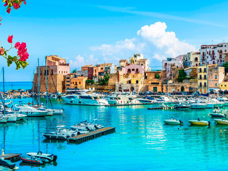 Palermo, Sicily's capital and Italy's largest island, offers diverse attractions for all ages. From UNESCO-listed historical monuments to breathtaking natural wonders like Zingaro reserve and Monte Pellegrino, it's a truly unique destination with inviting Mediterranean waters.