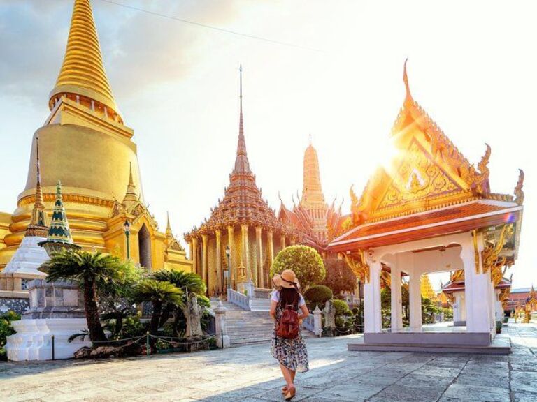 Grand Palace, Damnoen Floating Market And Maeklong Railway Market Tour – Full Day. Begin your journey at the heart of Bangkok, in the serene confines of Wat Phra Kaew, famously known as the Temple of the Emerald Buddha. One of Thailand's most revered shrines, this sacred space hosts a mesmerizing Buddha image meticulously sculpted from a single jade stone. Its deep spiritual significance combined with its splendid artistry makes it a paramount symbol of Thai religious devotion.