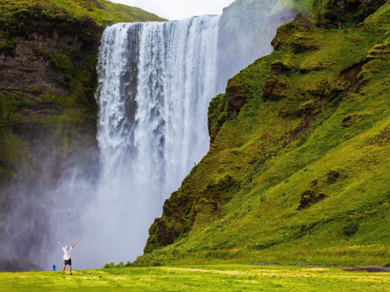 South Coast Classic (Guided In 10 Languages): Drive along the southwestern stretch of the ring road leading from Reykjavik along volcanoes, waterfalls, and glaciers to the black sand beach and Iceland's southernmost town, Vík. The tour starts with a drive through the Hellisheiði mountain pass bringing you through moss-covered lava fields and past geothermal springs down to farmland along the coastline.