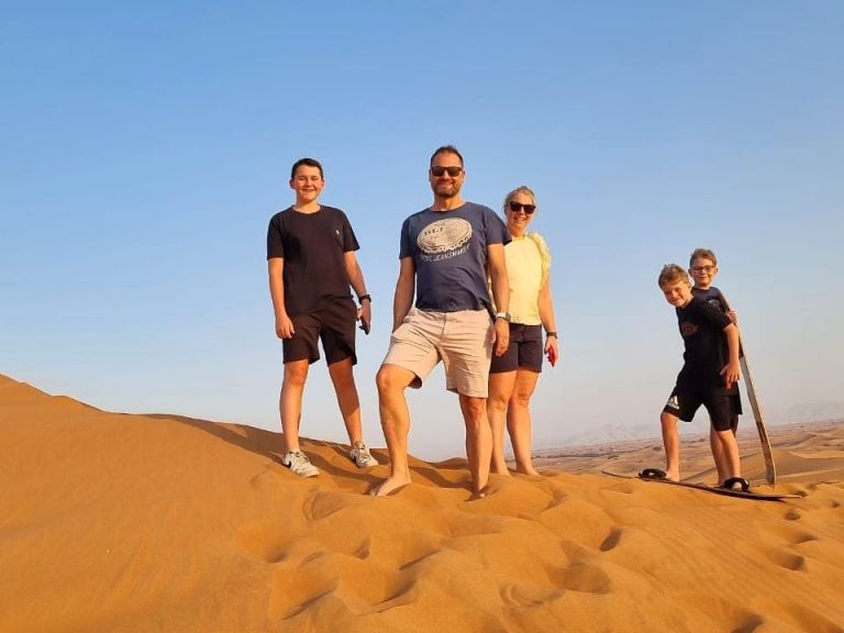 Private Afternoon Desert Safari with Quad Bike, Camel Ride and Sand-boarding.