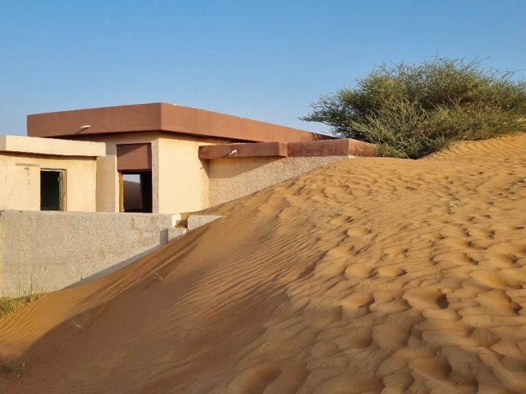Private Ghost Village Safari Tour with Dune Bashing and Sandboarding.
