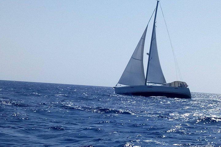 Private Coast to Coast Sailing Trip from Rhodes City.