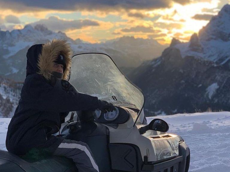 Dolomites Day Trip with snowmobile experience.