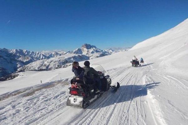 Dolomites Day Trip with snowmobile experience