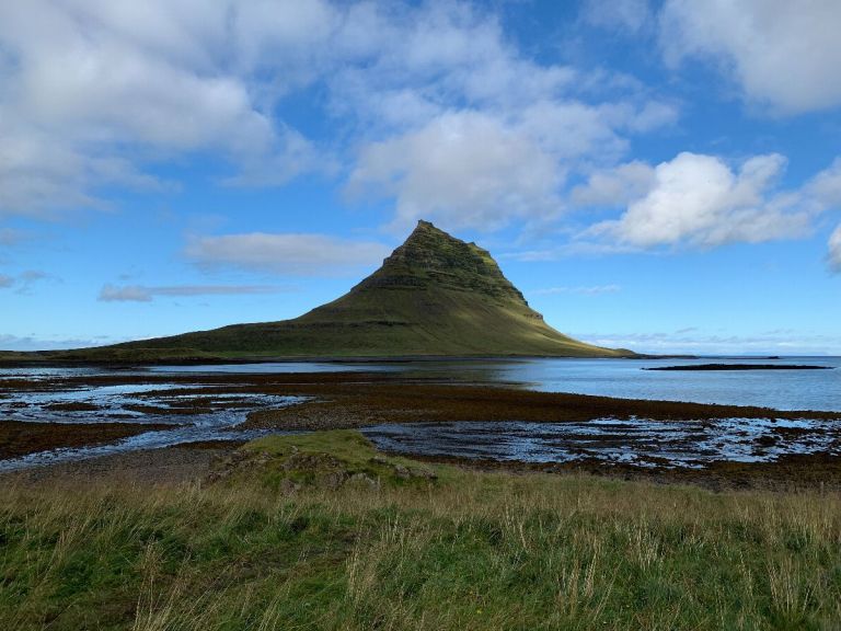 Snæfellsnes & Kirkjufell. We start the day by heading north, through the main town of western Iceland, Borgarnes. We continue our journey west onto the beautiful, multi coloured terrain of the Snæfellsnes peninsula and Kirkjufell mountain. The western tip of the peninsula is the newly designated national park, including the Snæfellsjökull glacier and stunning coastal beaches and cliffs.