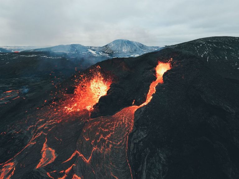 Fagradalsfjall Volcano Hike: Hike to the Fagradalsfjall Volcano eruption site with our expert guide where new lava flows into old and geothermal activity runs the scene! What better way to end the day than relaxing in the Blue Lagoon by getting the whole geothermal experience in one day. A tour to the active volcano in Geldingadalir valley and relaxation in the warm healing waters in the Blue Lagoon is a once-in-a-lifetime experience only Iceland can provide that you may not be able to come across again in your lifetime.