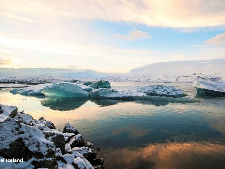 Jökulsárlón & South Coast Tour - Join us on a glacial mission and sail in-between the icebergs on our Glacier Lagoon tour including the sailing experience. Embark on a 14-hour tour from the capital, exploring Iceland's icy treasure and its ever-changing glacial landscape. Experience the captivating colors and mesmerizing forms firsthand.
