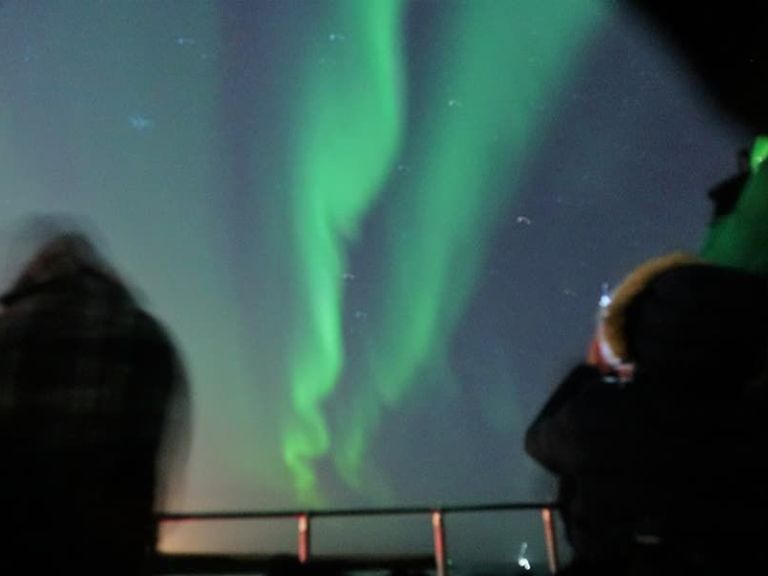 Northern Lights by Boat: Hunting the northern lights on the North Atlantic ocean is an amazing experience. Sailing away from the coastline of Reykjavik and seeing the Aurora Borealis out on the ocean with beautiful mountains and the city in the background is something to remember.