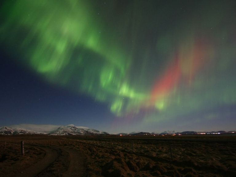 Northern lights minibus: Hunting in the north. EVENING TOUR – Escape the light pollution of the city and go with us outside Akureyri to see the amazing Northern lights.